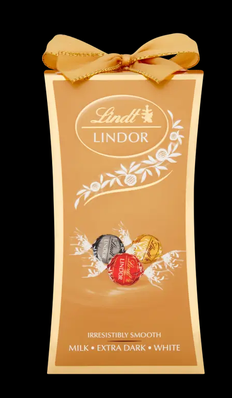 Lindt Lindor Асорти Бонбони 75 г – разнообразие от шоколадови бонбони с кремообразно сърце, произведени от майсторите шоколатиери на Lindt.