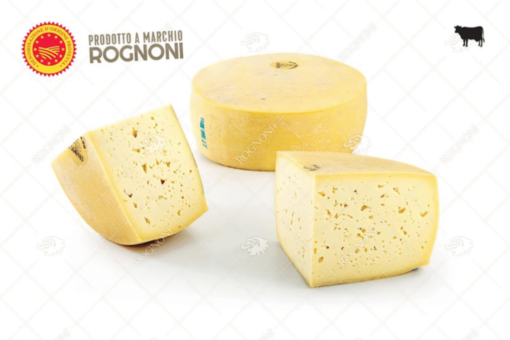 Сирене Rognoni Asiago DOP – хубаво парче със светло жълта, еластична текстура и тънка естествена коричка.