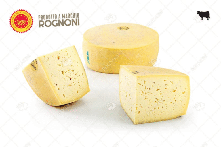 Сирене Rognoni Asiago DOP – хубаво парче със светло жълта, еластична текстура и тънка естествена коричка.